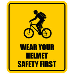 sign on a bicycle (Wear Your Helmet Safety First)