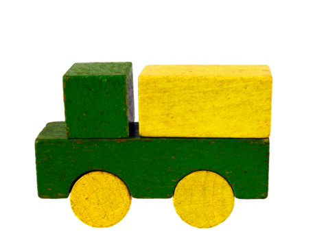 Lorry of wooden blocks, traditional toy on black background