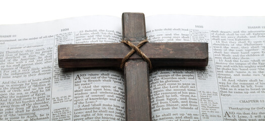 Open Holy Bible and wooden cross