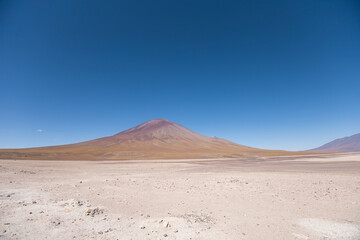 Fototapeta na wymiar desert nature, in the background a mountain and sky with clouds, natural tourist destination with desert landscape, place in latin america