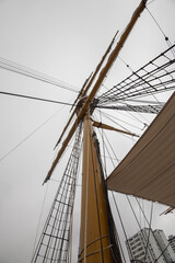 old wooden boat sailing on the mast, details of part of the boat, concepts