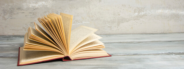 Books on wooden desk table and abstract background. Education background. Copy Space. Back to school.	