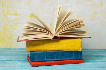 Books on wooden desk table and abstract background. Education background. Copy Space. Back to school.	