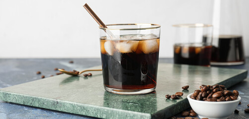 Glass of cold brew coffee on table