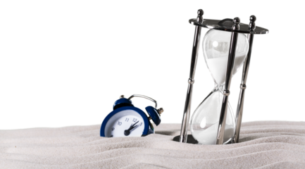 Retro hourglass on a sand dune beach