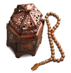 A bronze Ramadhan lamp with Islamic rosary