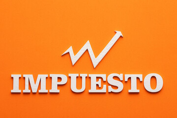 In white letters the word tax in spanish language - The tax is increased