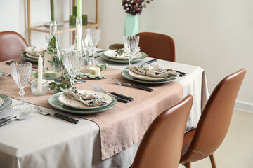 Beautiful setting with eucalyptus branches on served table