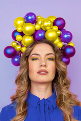 Ukrainian Girl with a yellow-blue crown of New Year's toys on her head blue blouse New Year Freedom