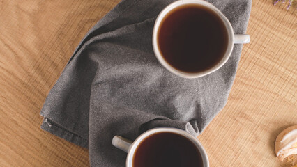 Two cups of tea on the wooden table