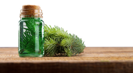 Medical oil in glass bottle and medicine herbs