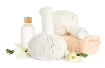 Fototapeta na wymiar Herbal massage bags, essential oil, flowers and towel on white background. Spa procedure