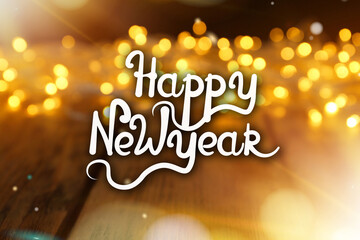 Happy New Year. Blurred view of glowing Christmas lights on wooden table, bokeh effect