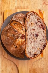 Walnut cranberry raisin dried fruit sourdough bread. Sourdough bread close up texture.