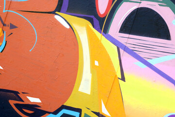 Colorful background of graffiti painting artwork with bright aerosol strips on metal wall. Old...