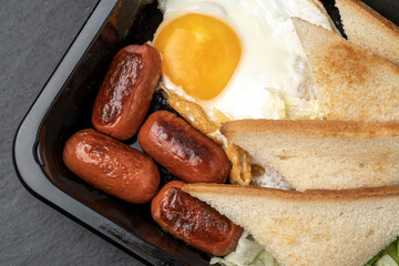 fast food and unhealthy eating concept - closeup of fast food snacks
