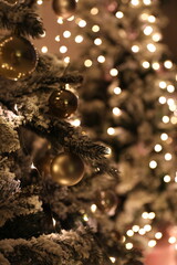 Closeup view of beautifully decorated Christmas tree indoors