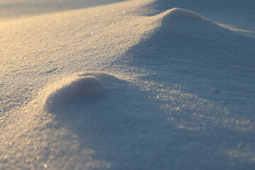 Beautiful snowdrift as background, closeup view. Winter weather