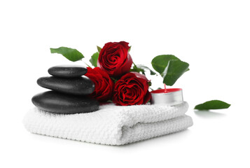 Obraz na płótnie Canvas Beautiful spa composition for Valentine's Day with flowers, towel, candle and stones on white background