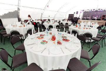served tables in the Banquet hall of the restaurant