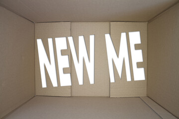 New Me word with cardboard box. Brown folded card box.