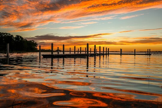 Fiery sunset over waves at Lake Dora in Mount Dora, Florida
