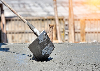 Concrete pouring tool during commercial concreting floors of building