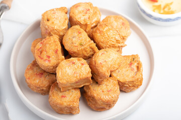 Deep Fried Chicken Roll in a white plate