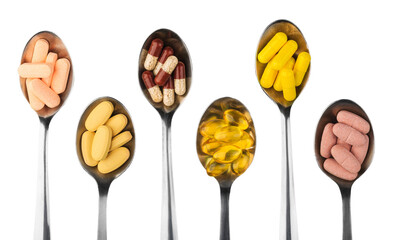 Supplement vitamin and health herbal pills in spoons