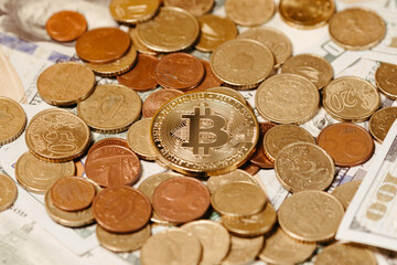 golden bitcoin coin with dollar and euro background