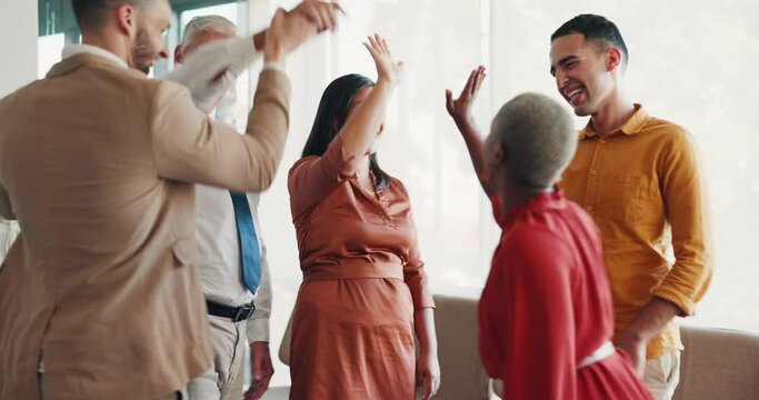 Success, high five and winner with business people in office cheering for celebration, support or goal. Team building, wow and growth with employees in workshop for achievement, deal and sales target