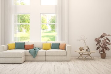 Minimalist living room in white color with sofa and summer landscape in window. Scandinavian interior design. 3D illustration