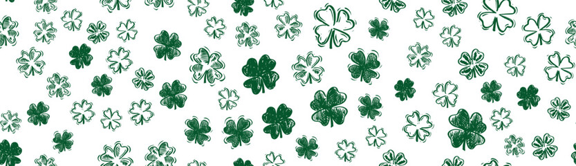 Festive background with flying clover, Saint Patricks Day.	