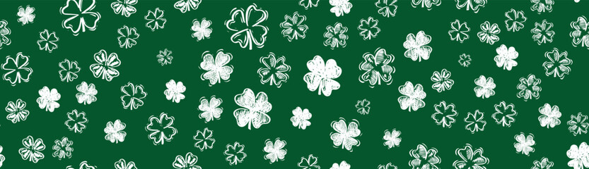 Festive background with flying clover, Saint Patricks Day.	
