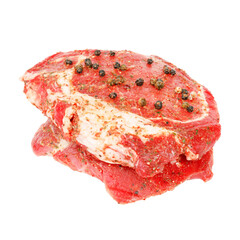 Marinated beef meat with spices on a white background, pork tenderloin.