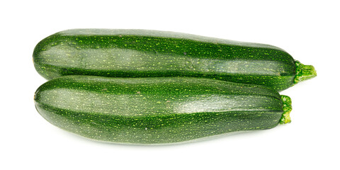 Two green zucchini on a white background, close-up. Organic vegetables.