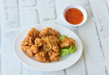 Deep fried chicken tendons with sweet sauce