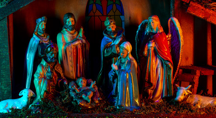 Nativity of Jesus. Christmas Christian nativity scene with Jesus in the manger, kings, farm animals...