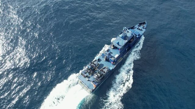 Fantastic aerial shot from above on a customs police patrol boat. National customs police against drug trafficking.