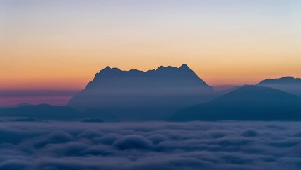 Majestic view of Doi Luang Chiang Dao in northern Thailand, the third highest mountain in Thailand, seen with beautiful dramatic clouds and colorful sky
