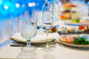 empty wine glasses on the table. tableware for the banquet. 