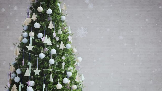 christmas tree with paster decoration and snow falling on brick white background, 3d rendering animation