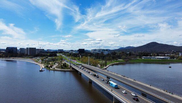 Aerial view of cars driving on the Commonwealth Bridge on Lake Burley Griffin in Canberra, Australia