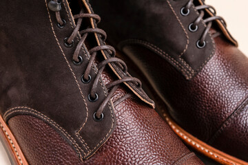 Extreme Closeup of Shoelaces of Premium Dark Brown Grain Brogue Derby Boots Made of Calf Leather...