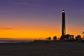 Fototapeta premium Travel Destinations. Lighthouse of Maspalomas At Gran canaria Island Known as Faro de Maspalomas at Sunset During Blue Hour
