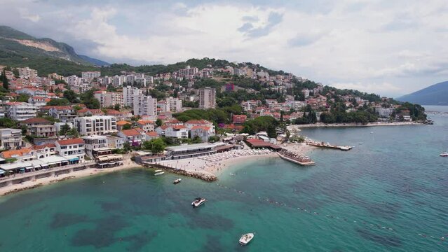 Herceg Novi, Montenegro. Drone Aerial View of Beaches in Topla Seaside Neighborhood on Sunny Summer Day
