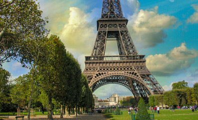 Paris, La Tour Eiffel. Summer sunset above city famous Tower