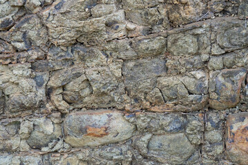 The gray volcanic rock layer formed by the deposition of volcanic magma is a natural beauty.  The...