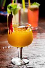 tasty cocktail on the wooden background