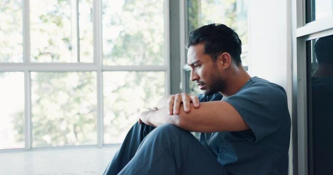 Nurse, Stress Or Depression Man On Hospital Floor In Virus Death, Surgery Fail Or Patient Loss Grief In Japanese Clinic. Mental Health, Sad Or Anxiety For Crying Healthcare Worker In Medical Burnout